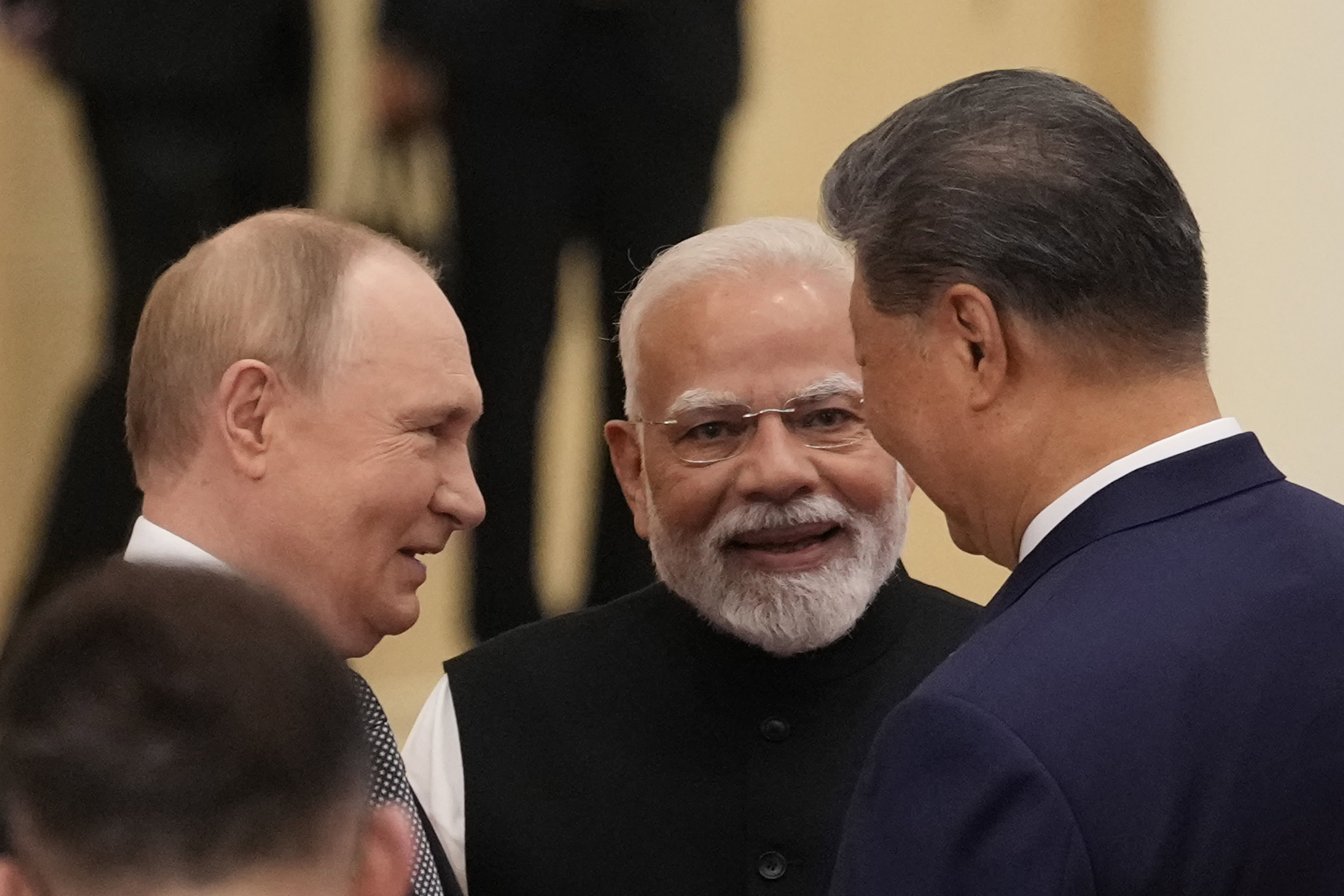 TIANJIN, CHINA - SEPTEMBER 01: Indian Prime Minister Narendra Modi talks with Russian President Vladimir Putin(L) and Chinese President Xi jinping ahead of the Shanghai Cooperation Organization (SCO) Summit 2025 at the Meijiang Convention and Exhibition Centre on September 1, 2025 in Tianjin, China. (Photo by Suo Takekuma - Pool/Getty Images)